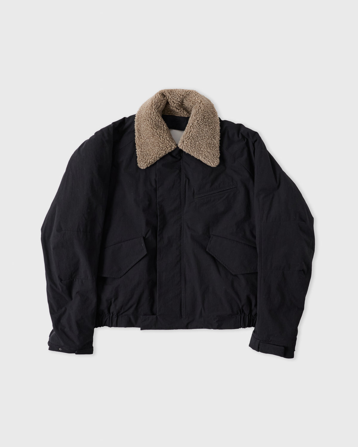 Sage Nation Toya Bomber in dark navy cotton-nylon, front, flat lay