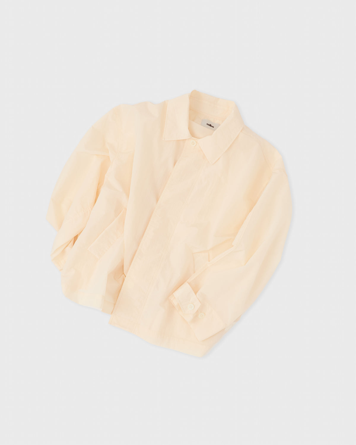 Colbo Storm Jacket in sheer pearl, side, flat lay